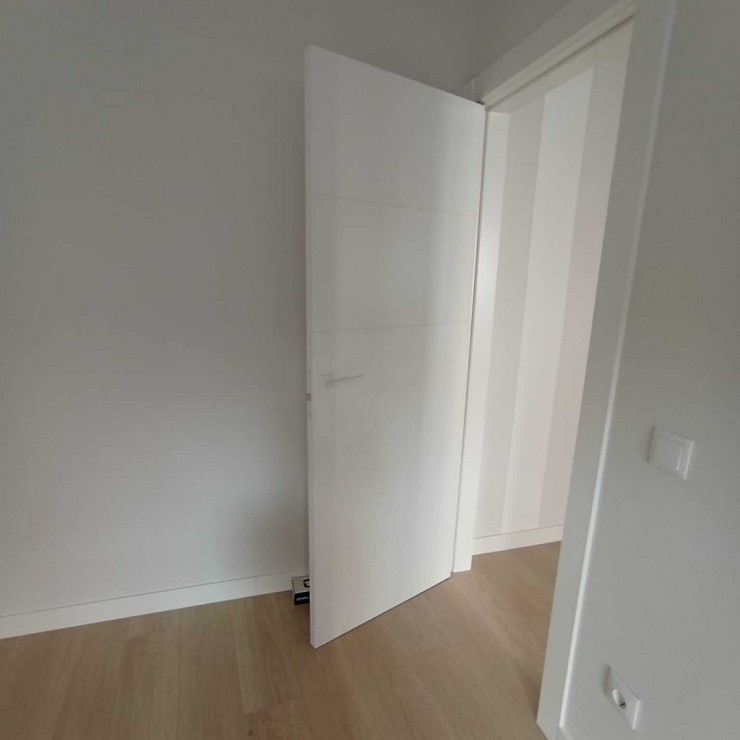 DETALLE PUERTA DORMITORIO